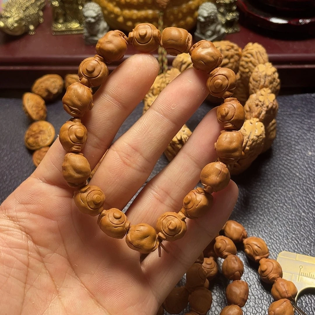龙纹桃核雕刻瑕疵茶壶