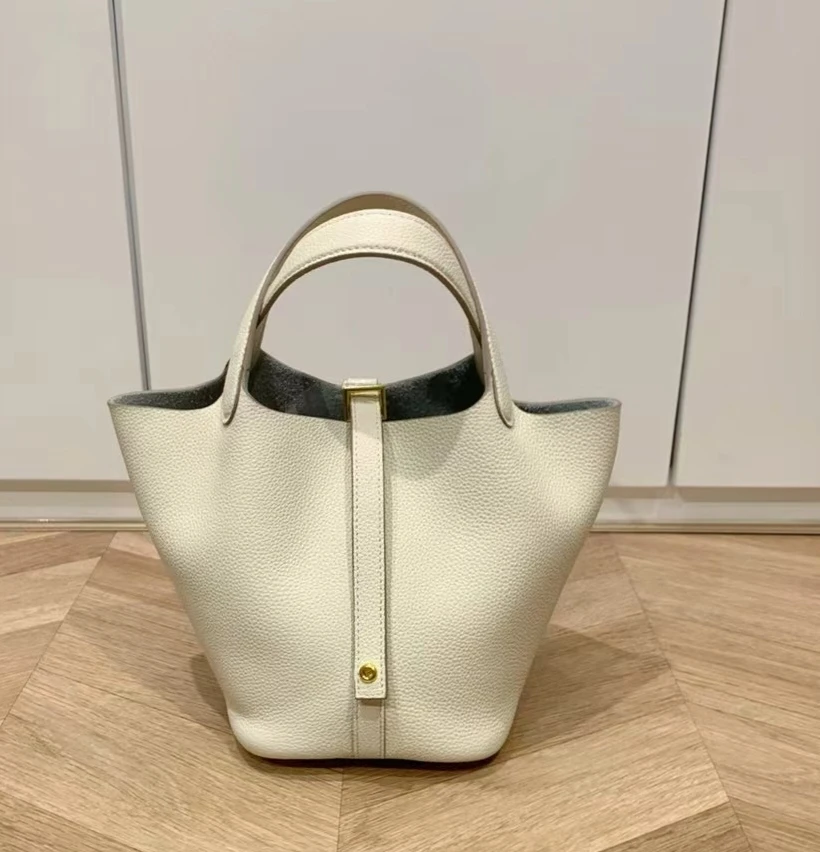 时尚百搭手提包包2025新款休闲字母包togo头层牛皮菜篮子包大容量