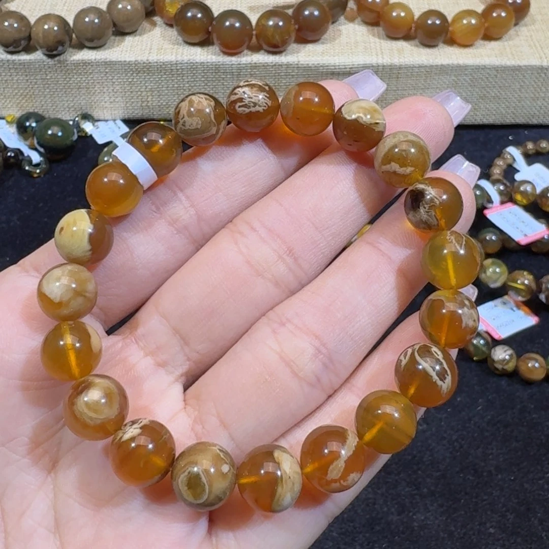 琥珀珠宝奇石未镶嵌9.9mm橘蜜白蜡溶洞