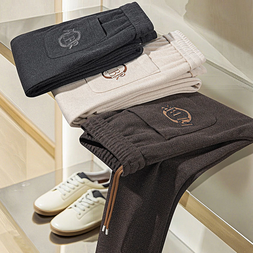 秋冬轻奢潮流刺绣保暖羊毛呢裤子男士直筒卫裤字纹提花修身休闲裤