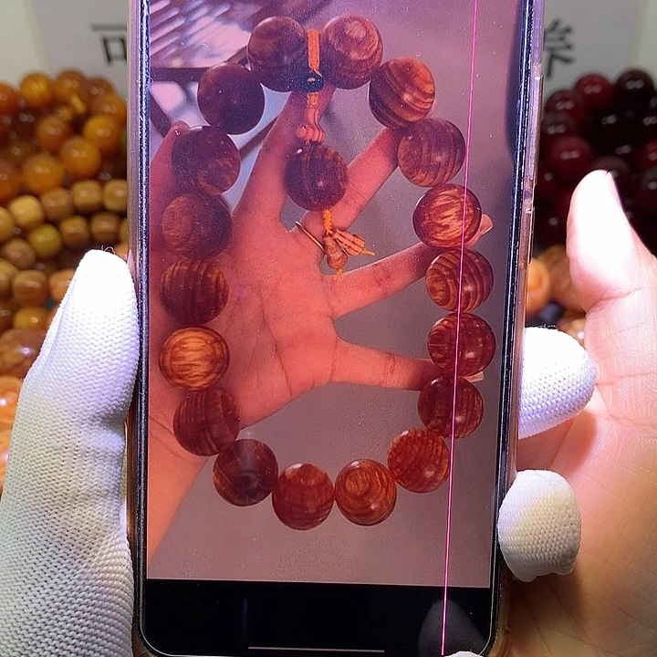 轩***爸松木（琥珀木）手串/手链2.5*18 手持