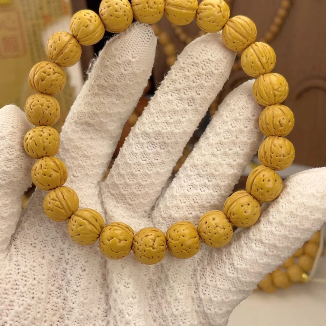 桃核吊坠盘锦野生圆皮小黄桃无修边肚同尺矮装