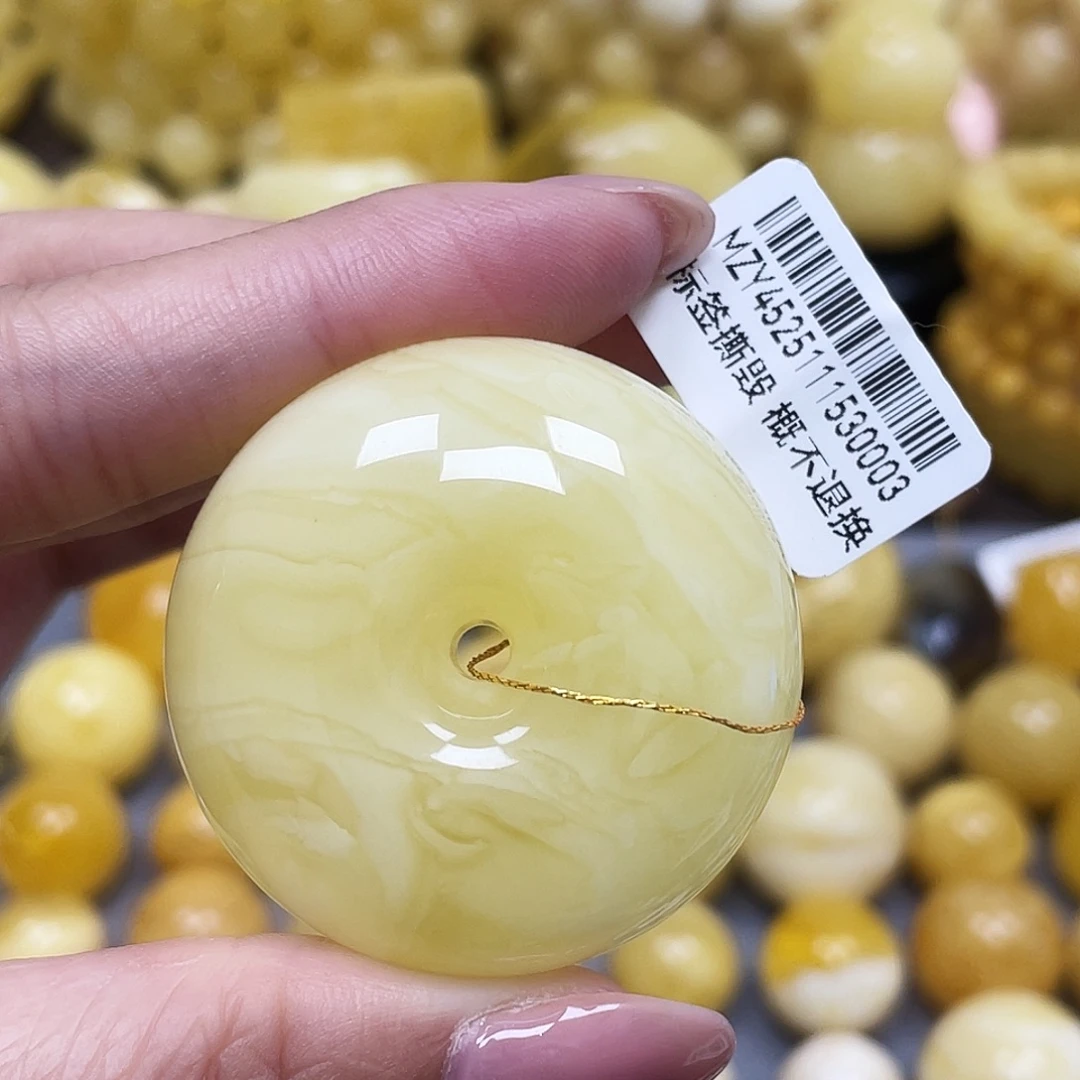 来***来蜜蜡未镶嵌裸石39.7mm瑕
