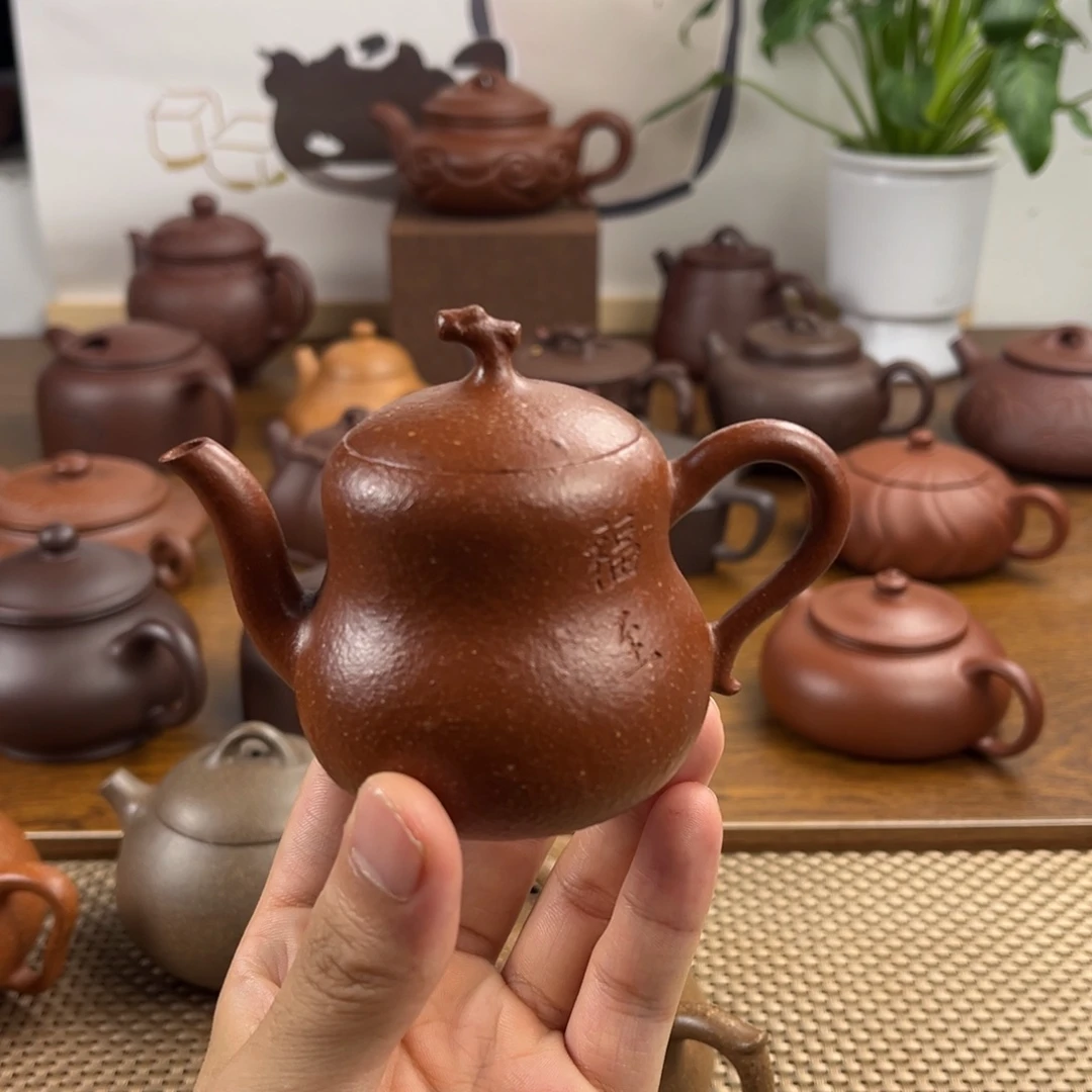 雪***阁茶壶紫砂手工制作
