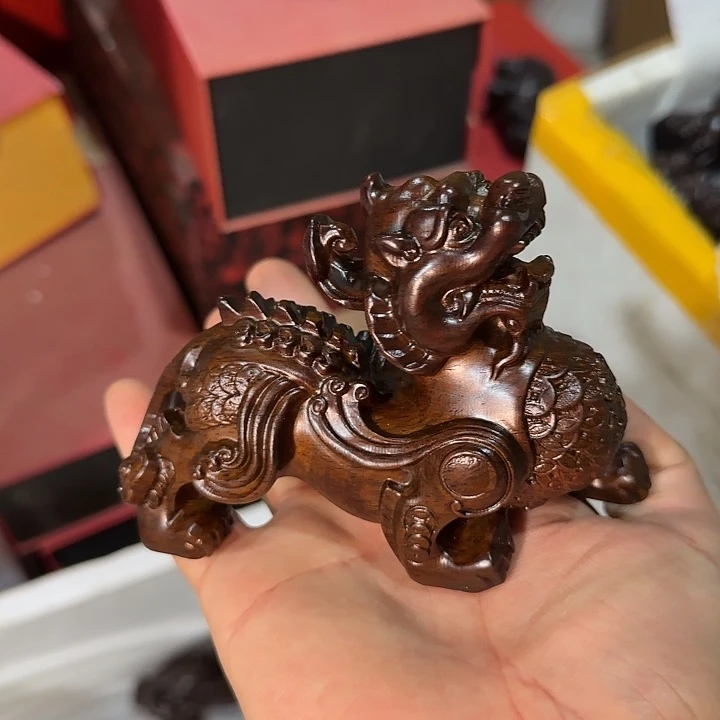 木黑檀木12金钱貔貅一只