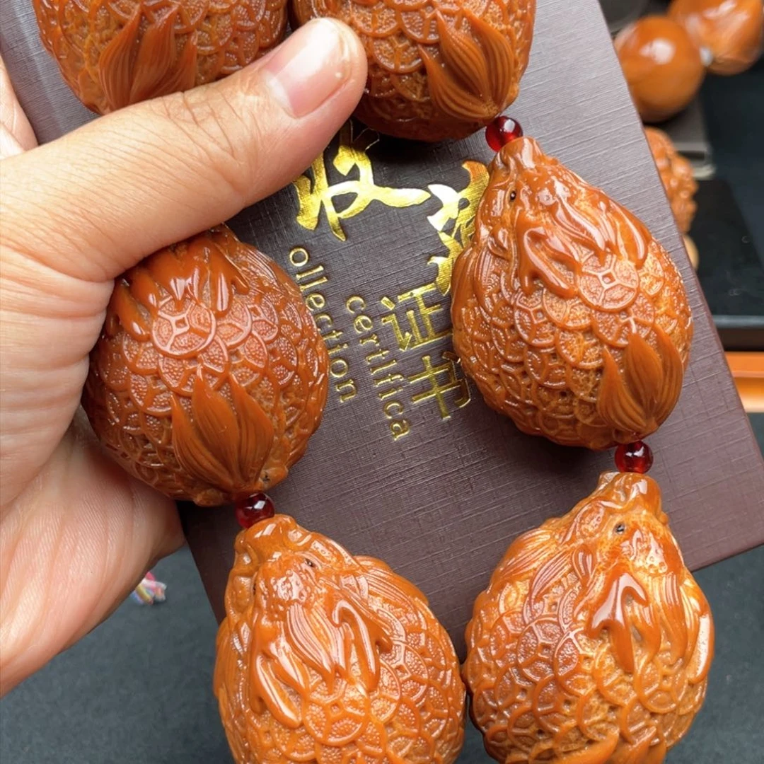 把件橄榄核金币龙龟手持