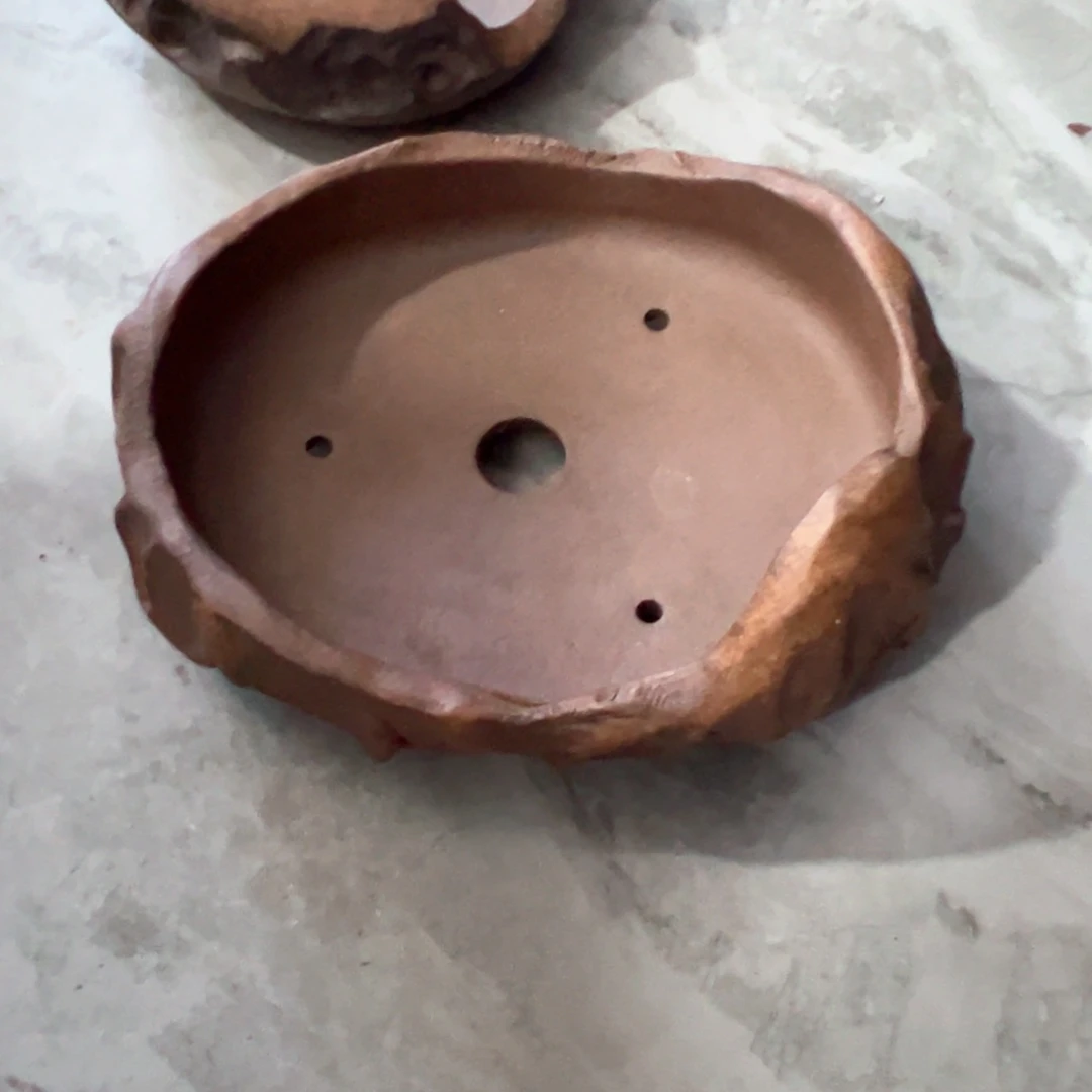 紫砂花盆手工制作工艺精湛
