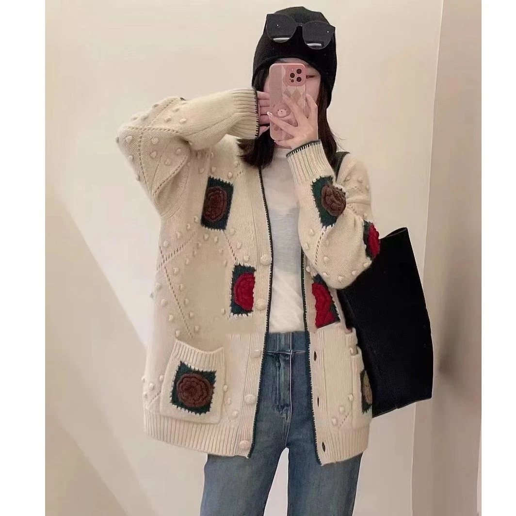 KIKI严选：0010-欧洲站南油秋冬新款方块立体花朵V领毛衣外套