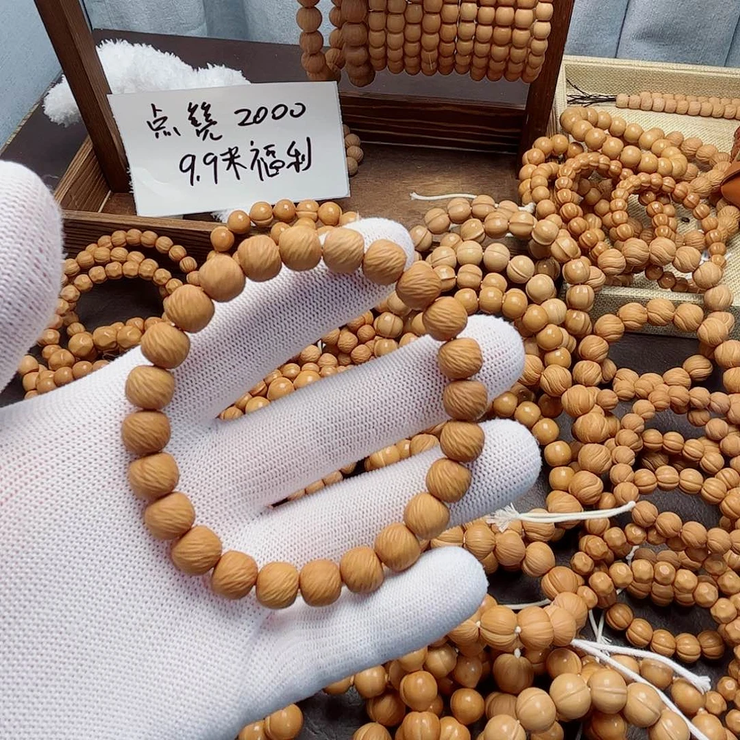 王***哈吊坠猴头核桃云锦