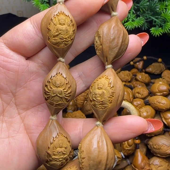 心***笑橄榄核雕刻手串守护神