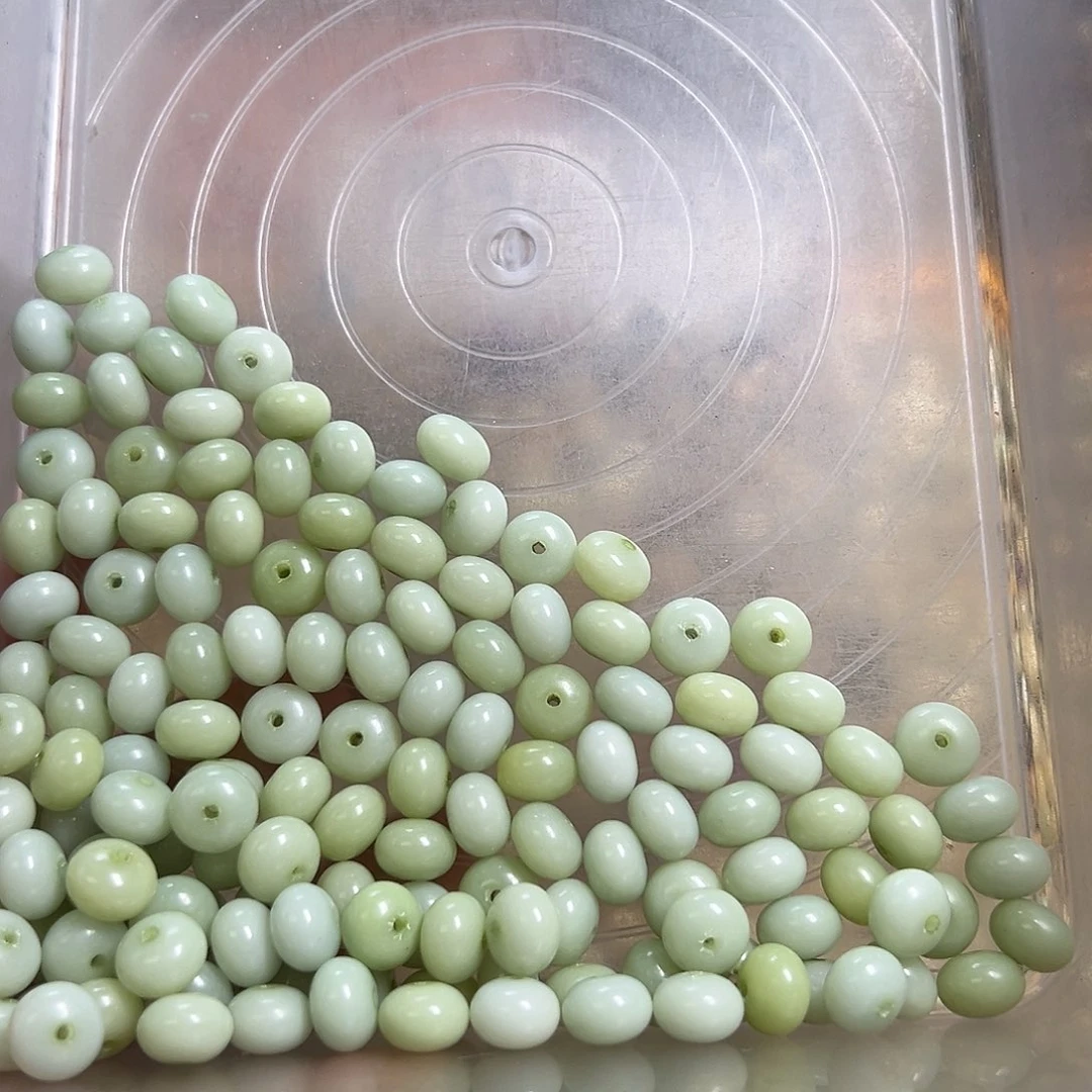 菩提根/象牙果吊坠古**一卡11青算盘100多颗微瑕