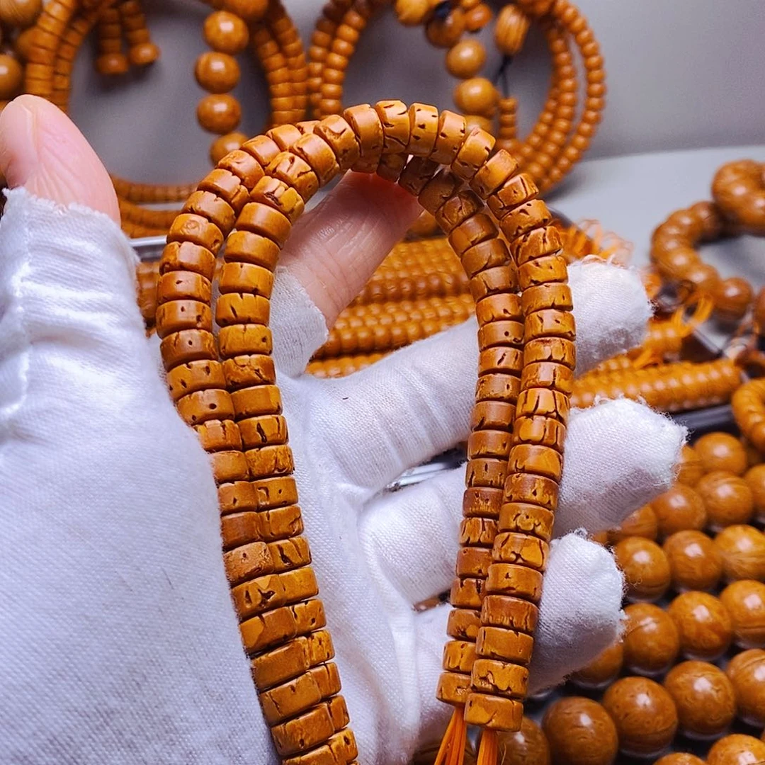 桃核吊坠4乘8奶片手串瑕疵品40