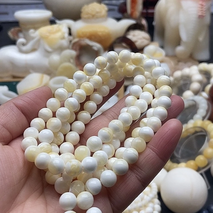 非金属贝壳全品蜜蜡色0.8多圈