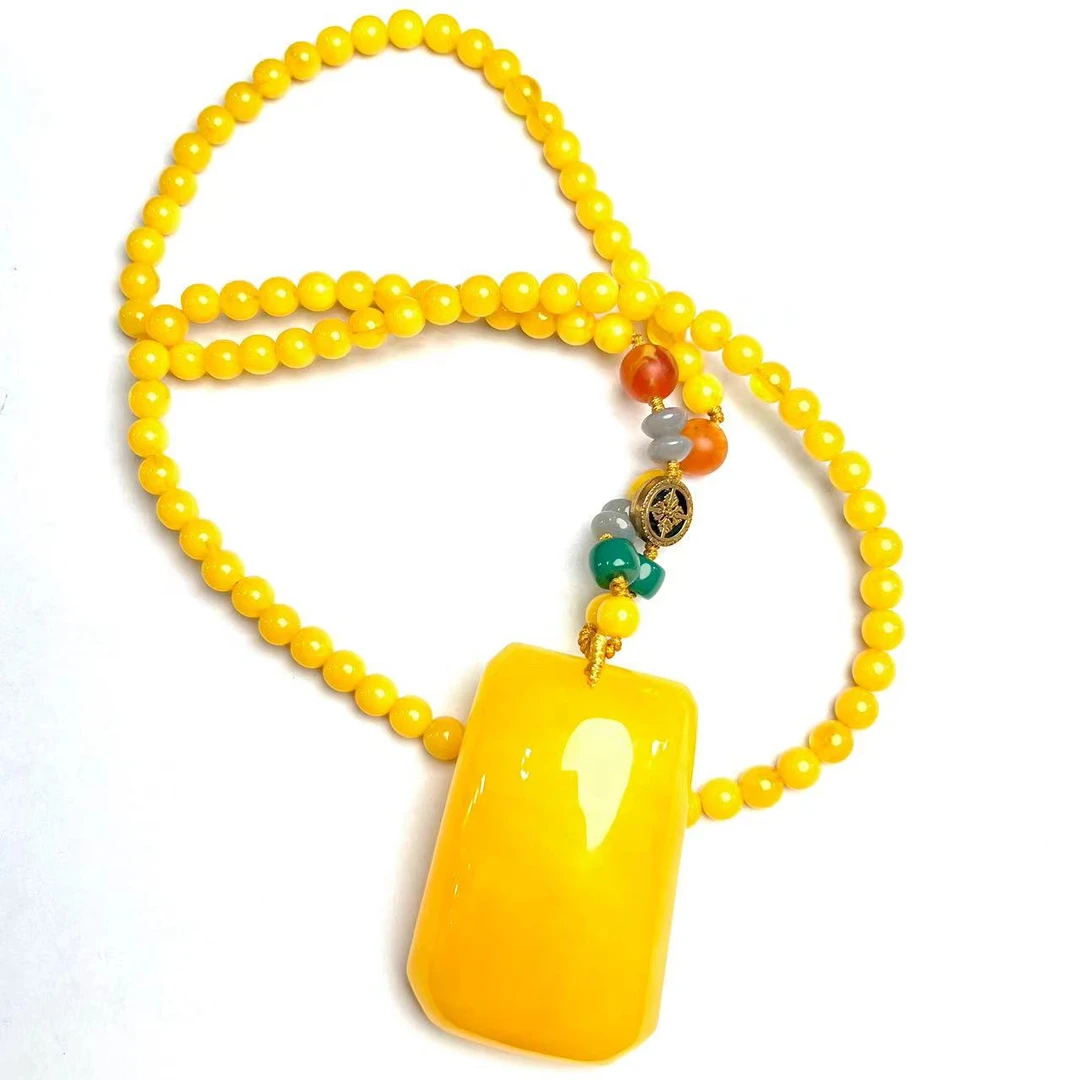 ZX057-天然蜜蜡精美吊坠 - 尺寸60*40*21