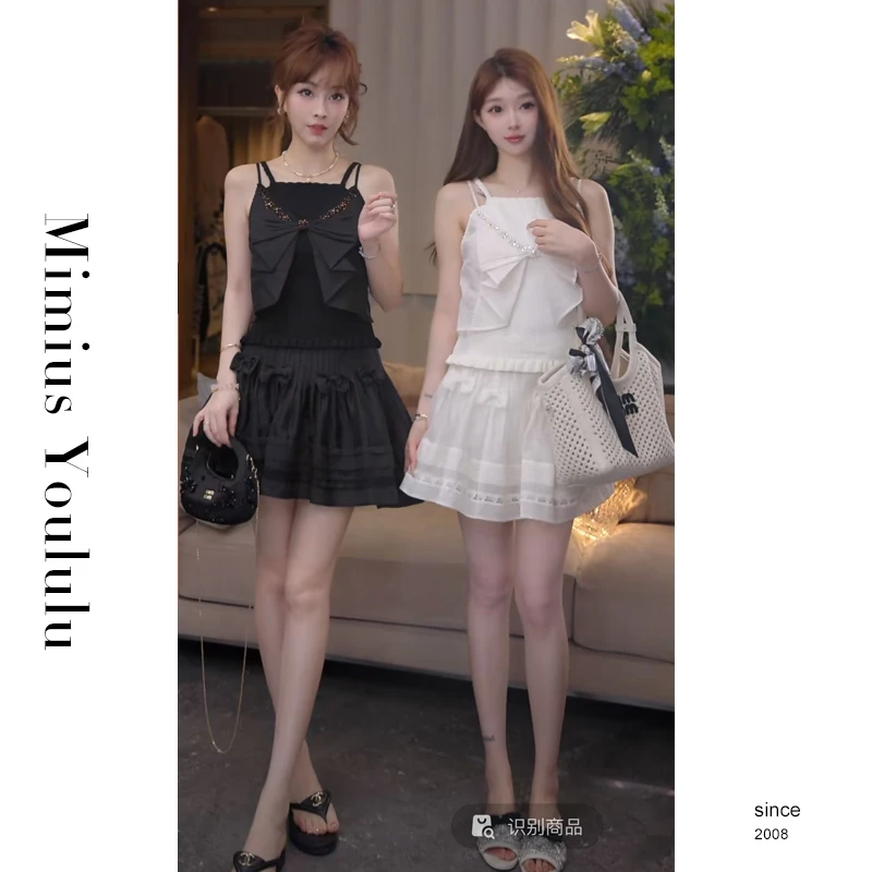 【mimius】七七钉珠蝴蝶结木耳边针织吊带上衣（肩带可调节） WG06022