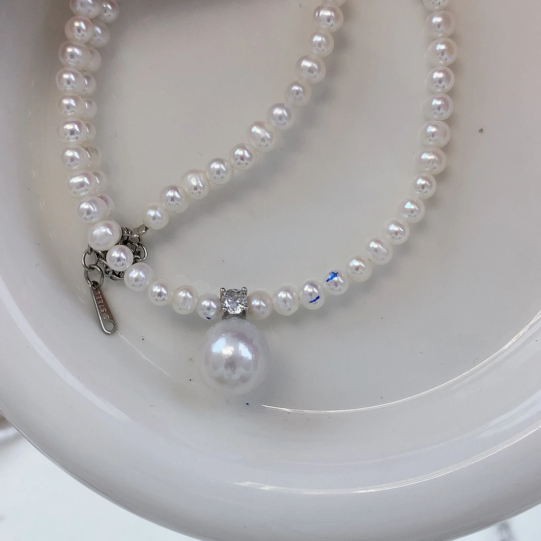 银S925镶嵌耳饰淡水珍珠王妃