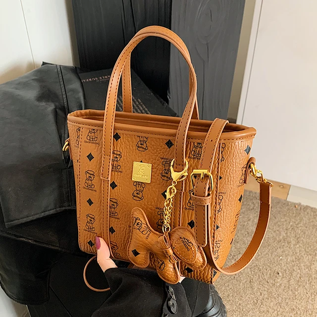 高级感手拎水桶包女2025冬季新款复古时尚单肩包小众潮流休闲女包