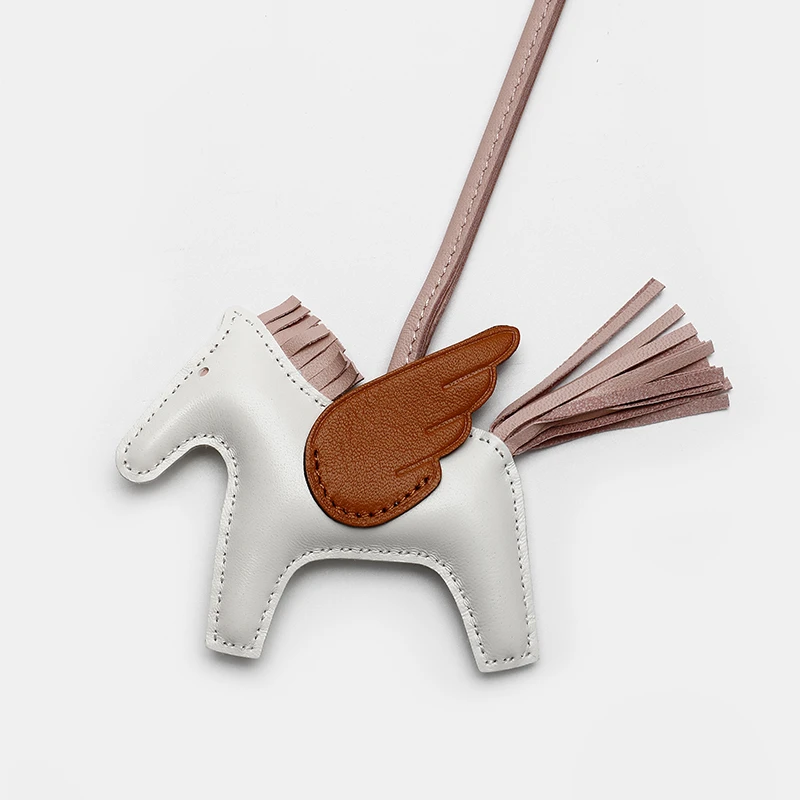 时尚真皮小马挂饰包包可爱配将