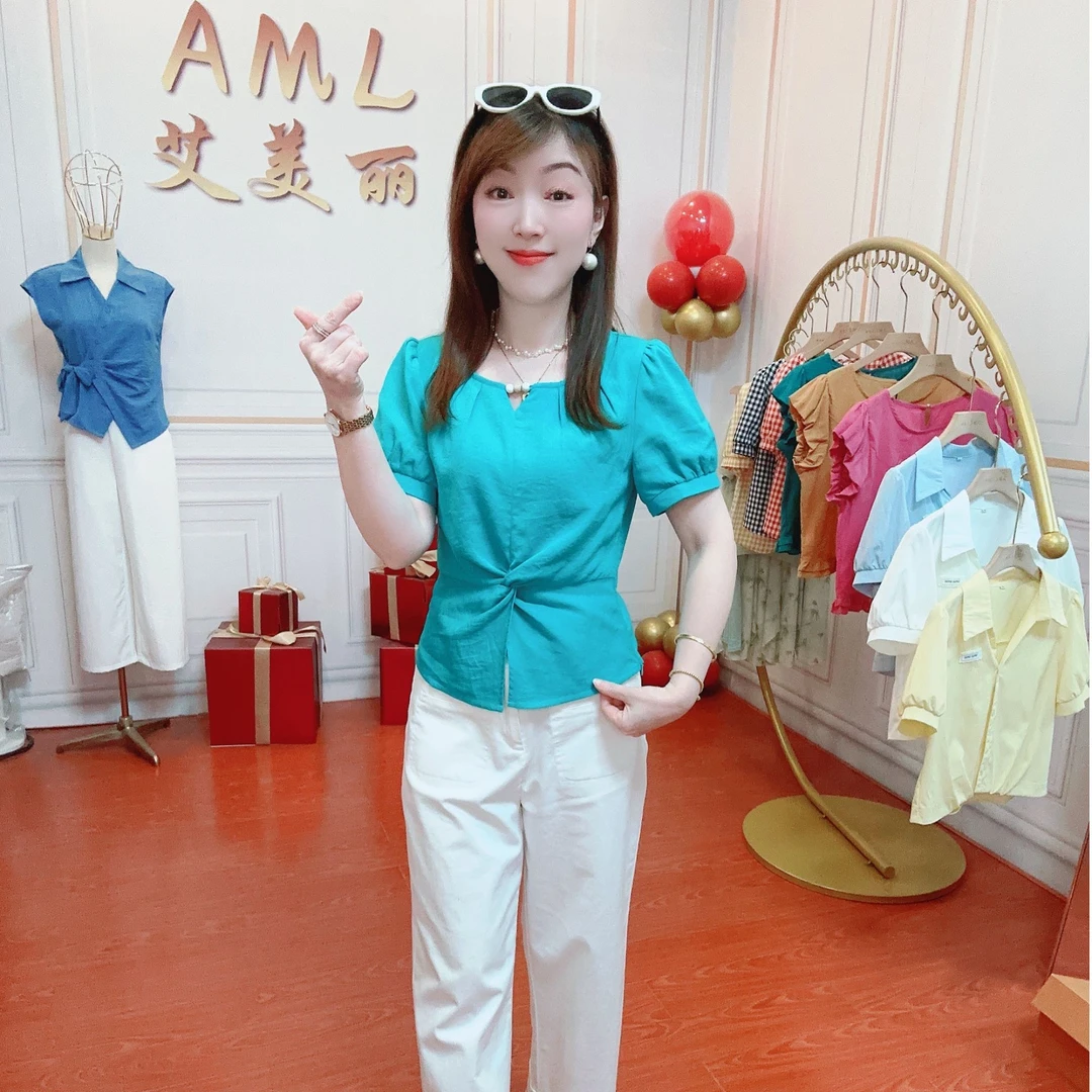 AML3 下摆开叉时尚扭结遮肚显瘦2025设计感气质百搭圆领衬衫女