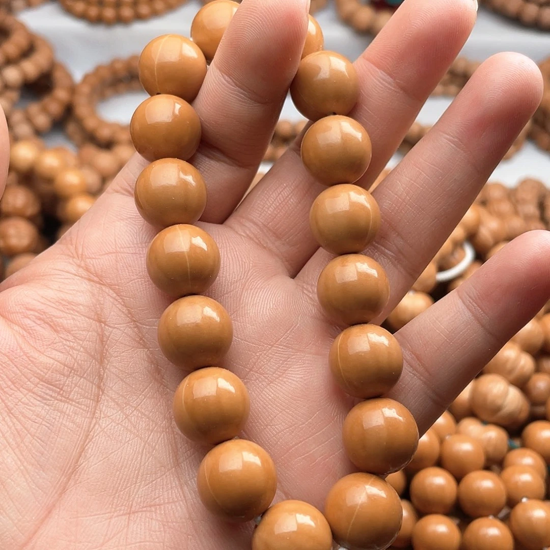 猴头核桃吊坠14+正圆光珠手持