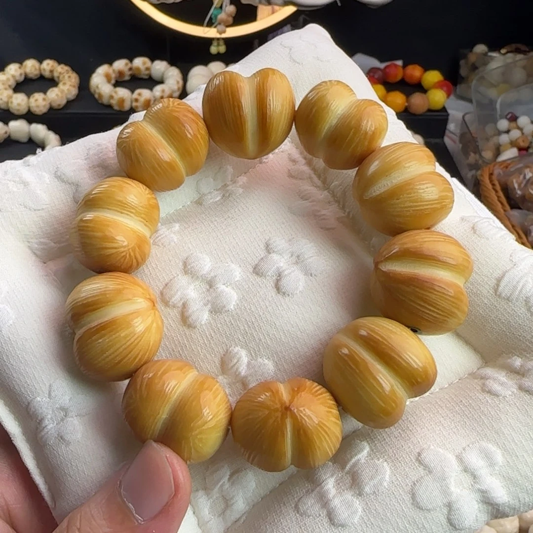 菩提根/象牙果吊坠微瑕疵炭烤屁桃手串一条