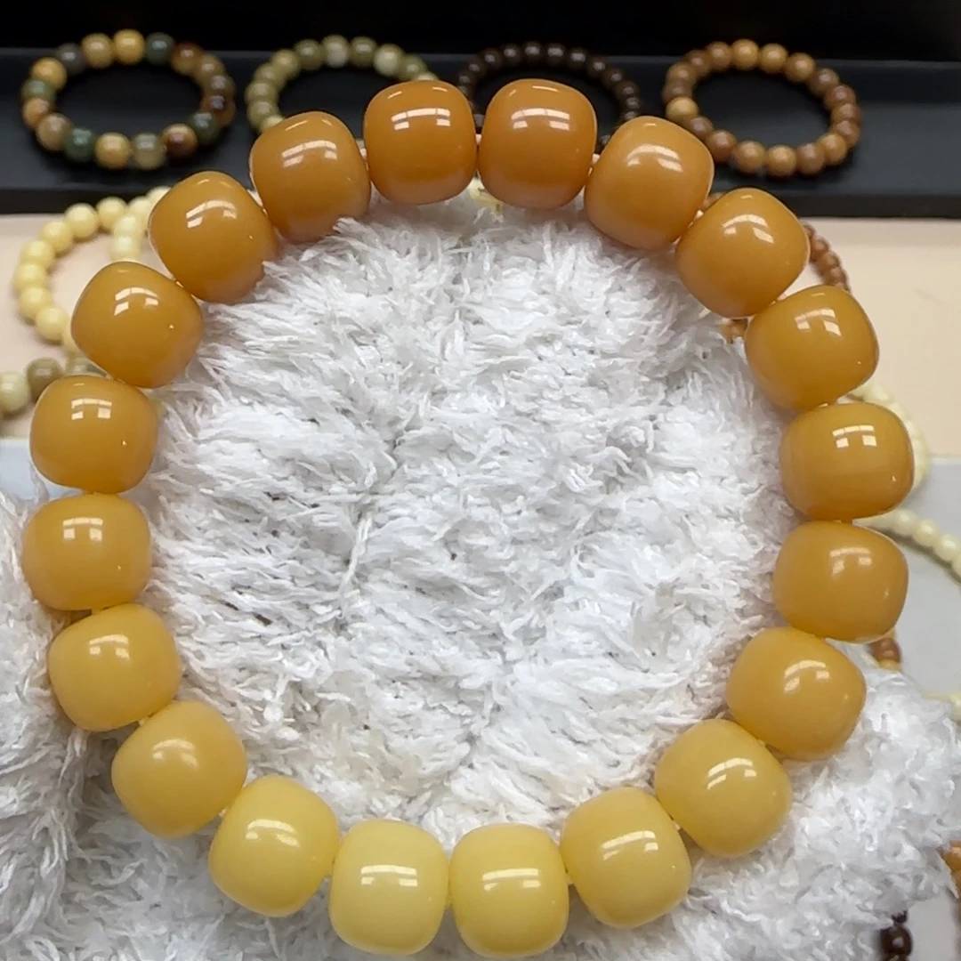 手串菩提根/象牙果11*12 精工 黄渐变 10年
