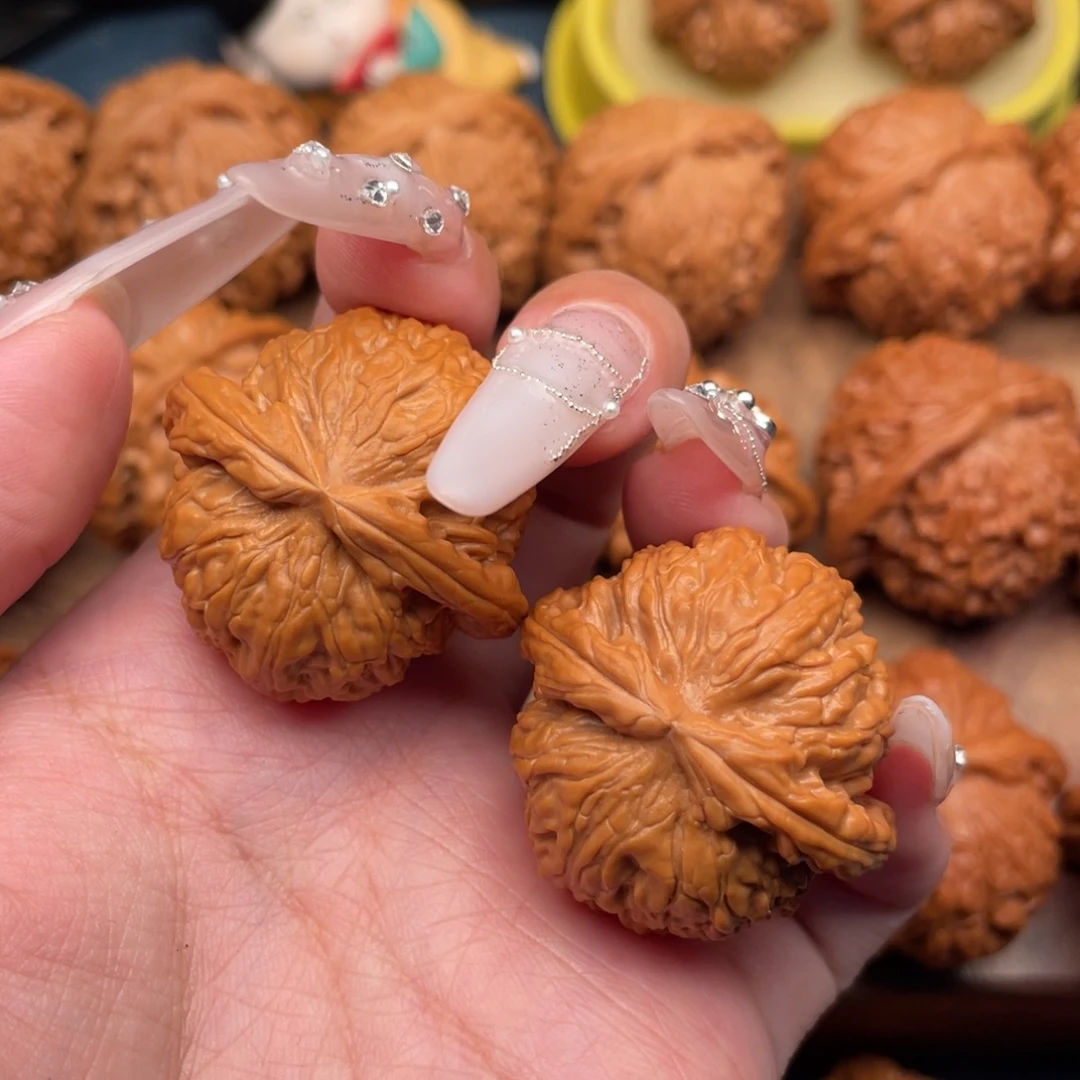 文玩核桃把件全品，精配红皮球白35