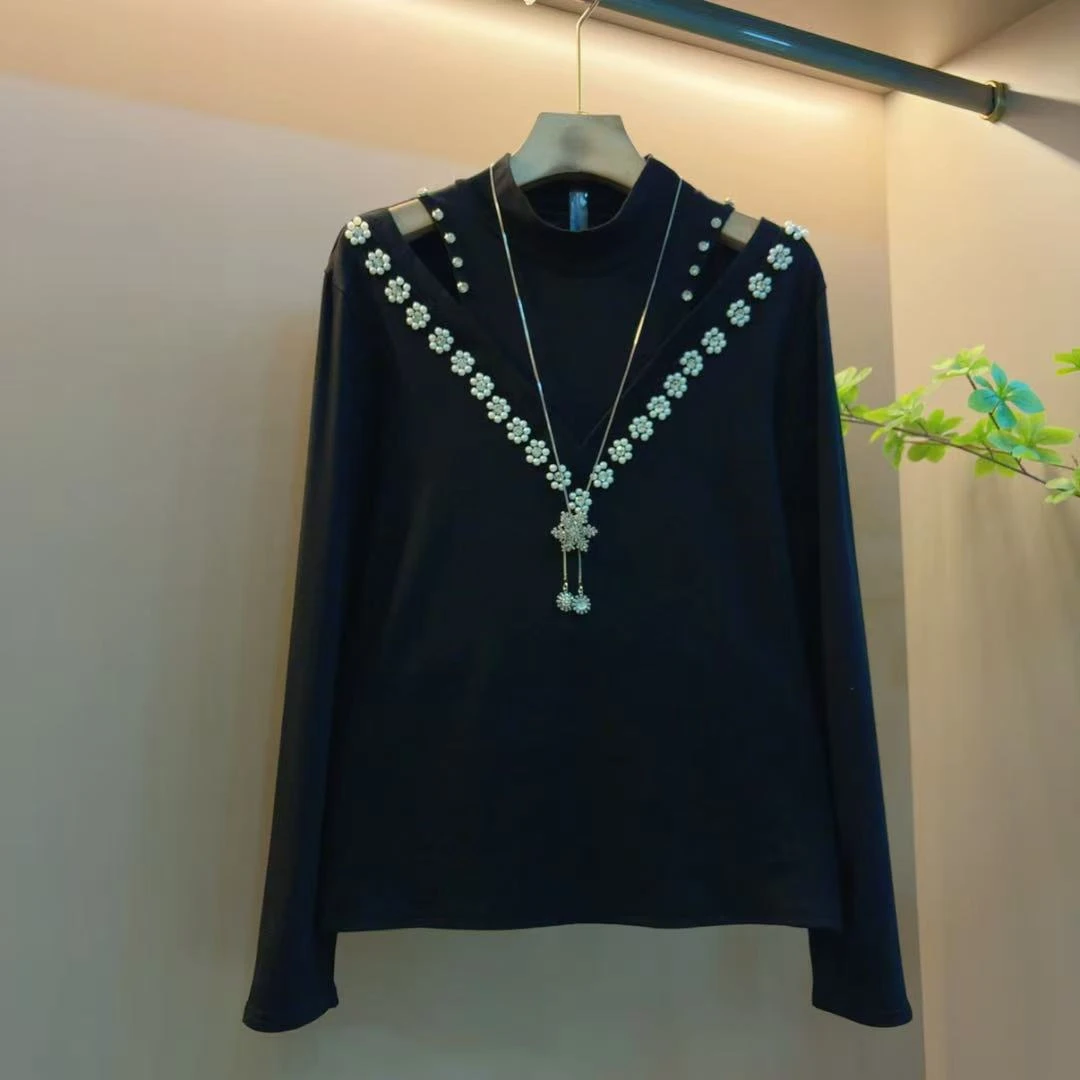 新款时尚洋气显瘦藏肉气质百搭重工轻奢镂空上衣（衣长60左右）