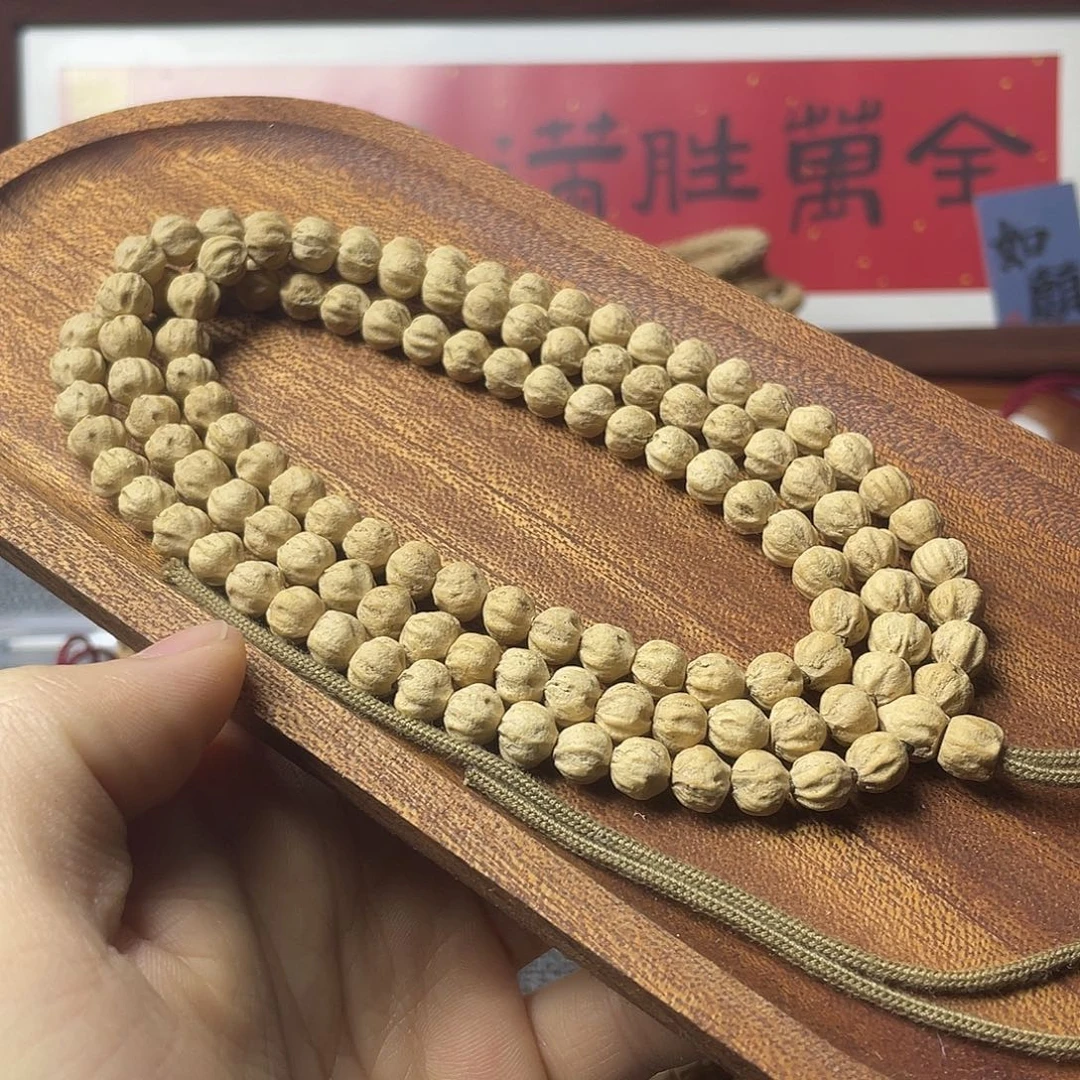 F****柏香籽/百香籽吊坠粉皮原桩莲花7.7mm