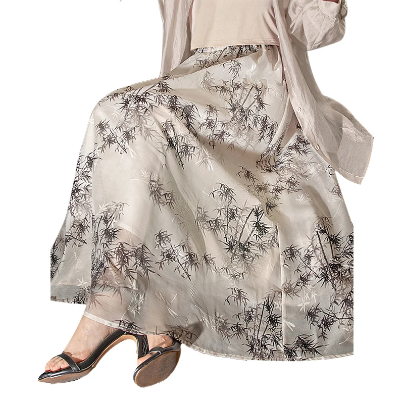 丝柏舍2025冬季欧若风印花松紧腰A字长款气质半身裙S51R0576B