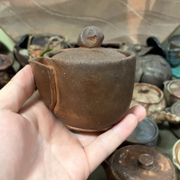 过***客瓷片备前。          宝瓶