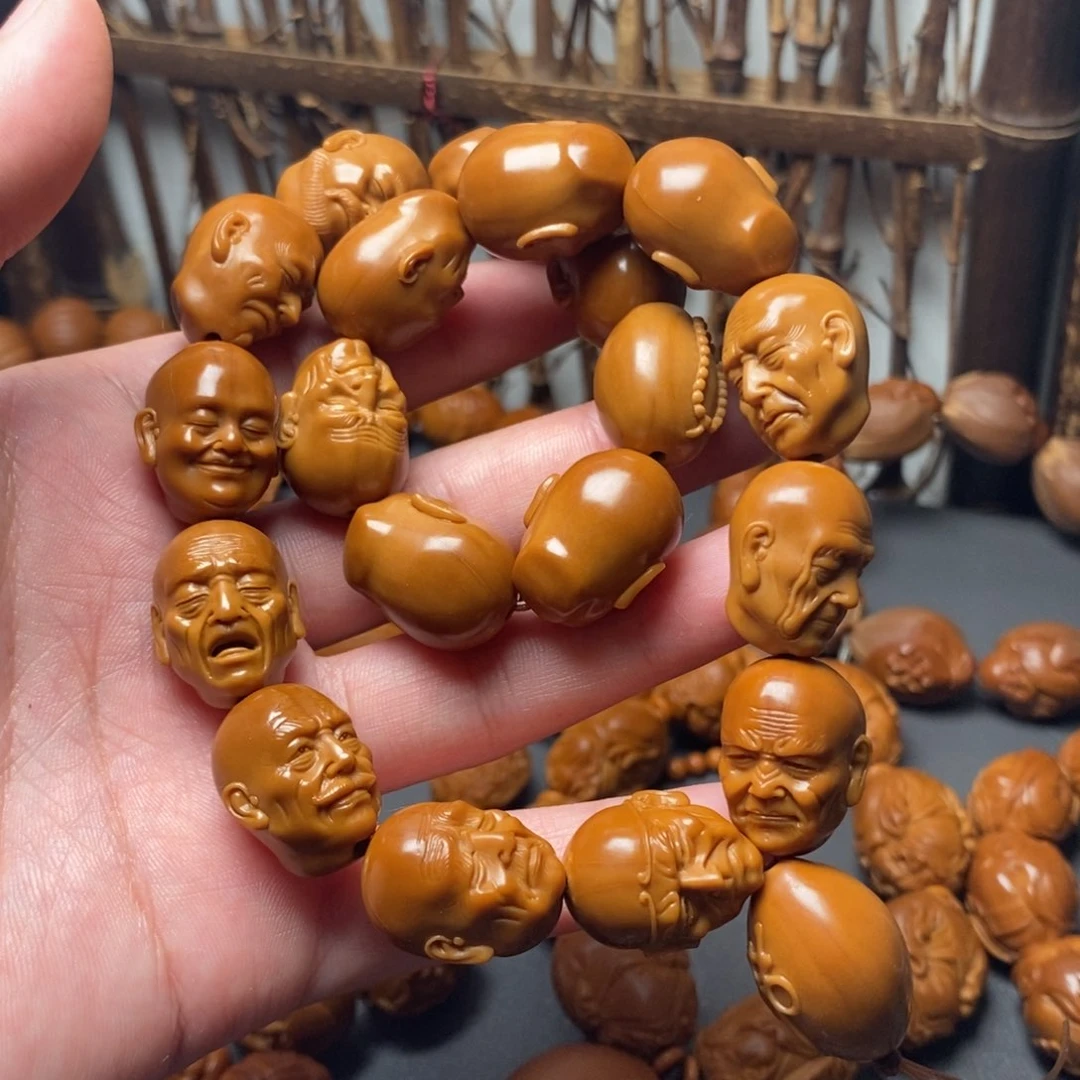橄榄核手串一*。罗汉手持