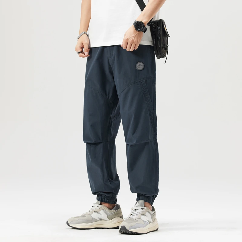 工装休闲裤男2025新款美式宽松潮牌哈伦运动青年时尚束脚裤子男款
