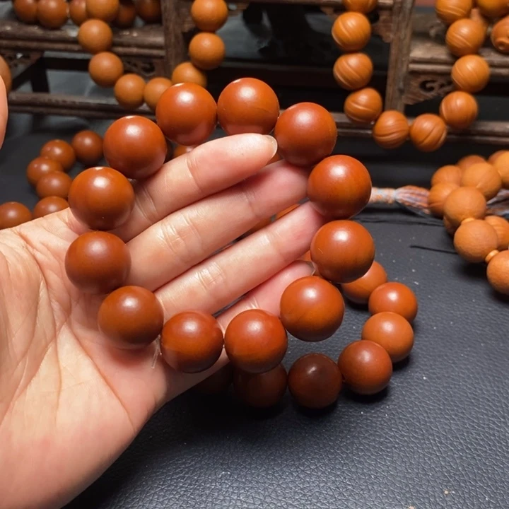 手串橄榄核1.85尺寸树王鸡血红光珠微色差