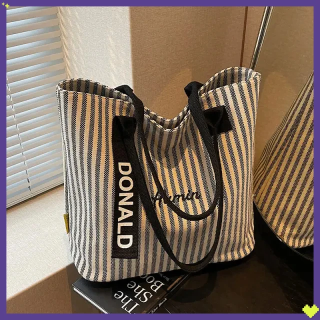 条纹大容量帆布包包女2025新款BJXP时尚手提单肩购物袋休闲【盛固】