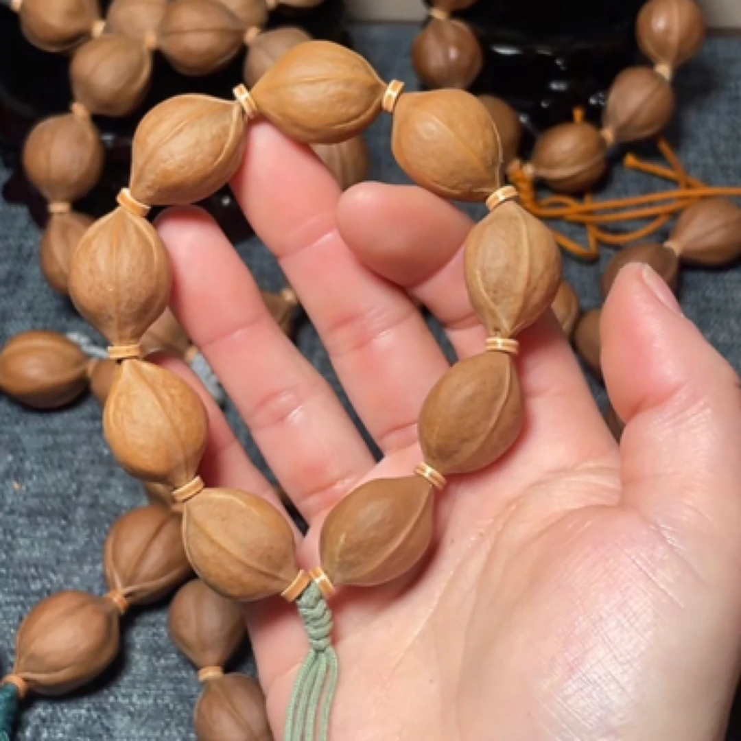 1825梅林铁三花橄榄素核原皮