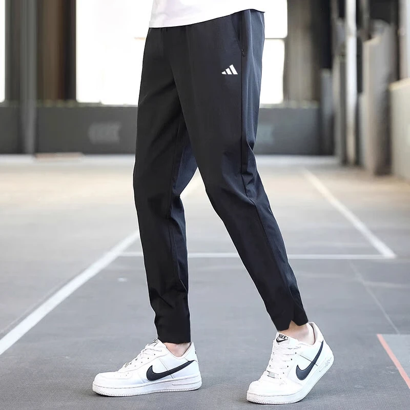 Adidas阿迪达斯梭织长裤男夏季新款运动裤休闲宽松训练裤子IK9680