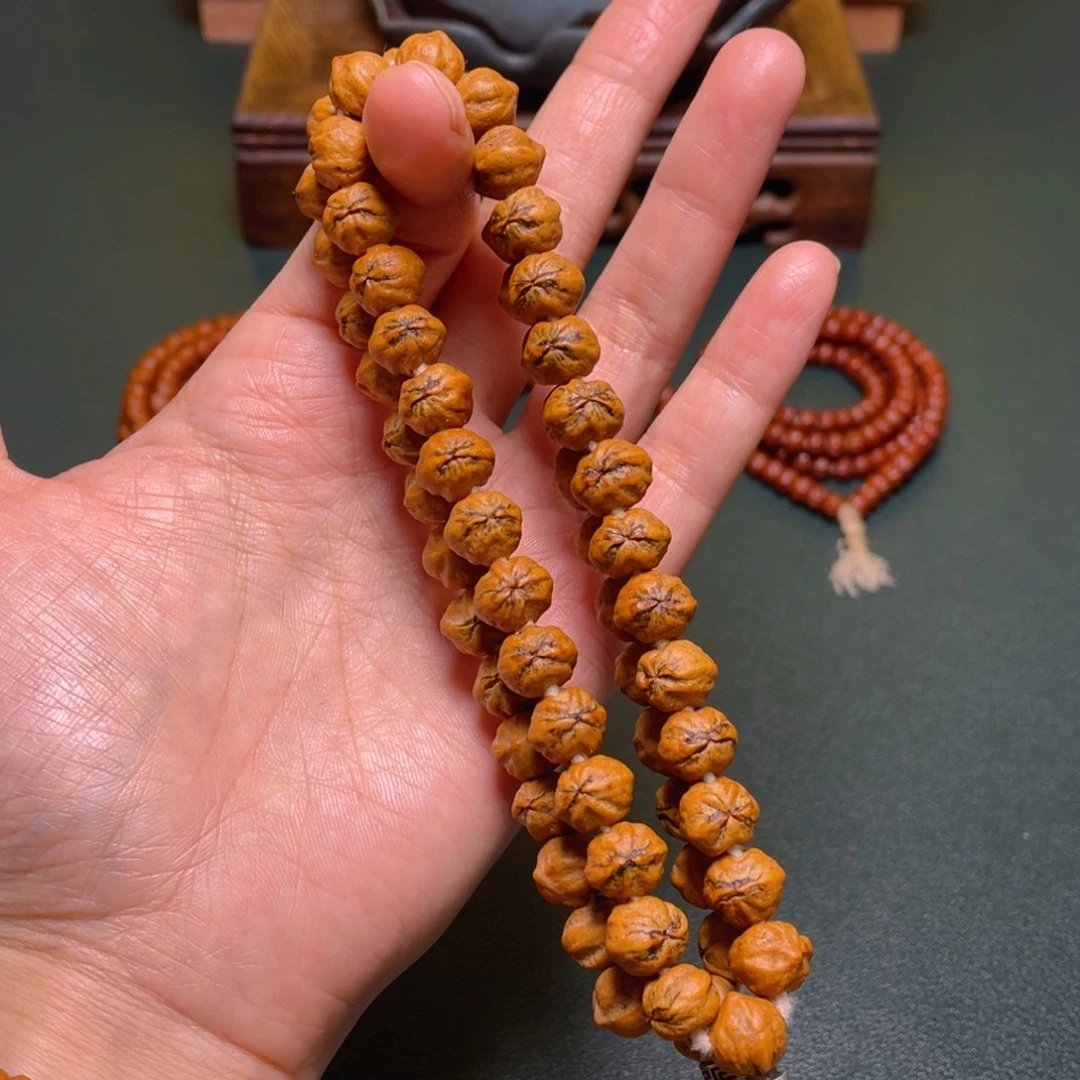 柏香籽/百香籽吊坠恶魔之眼手持