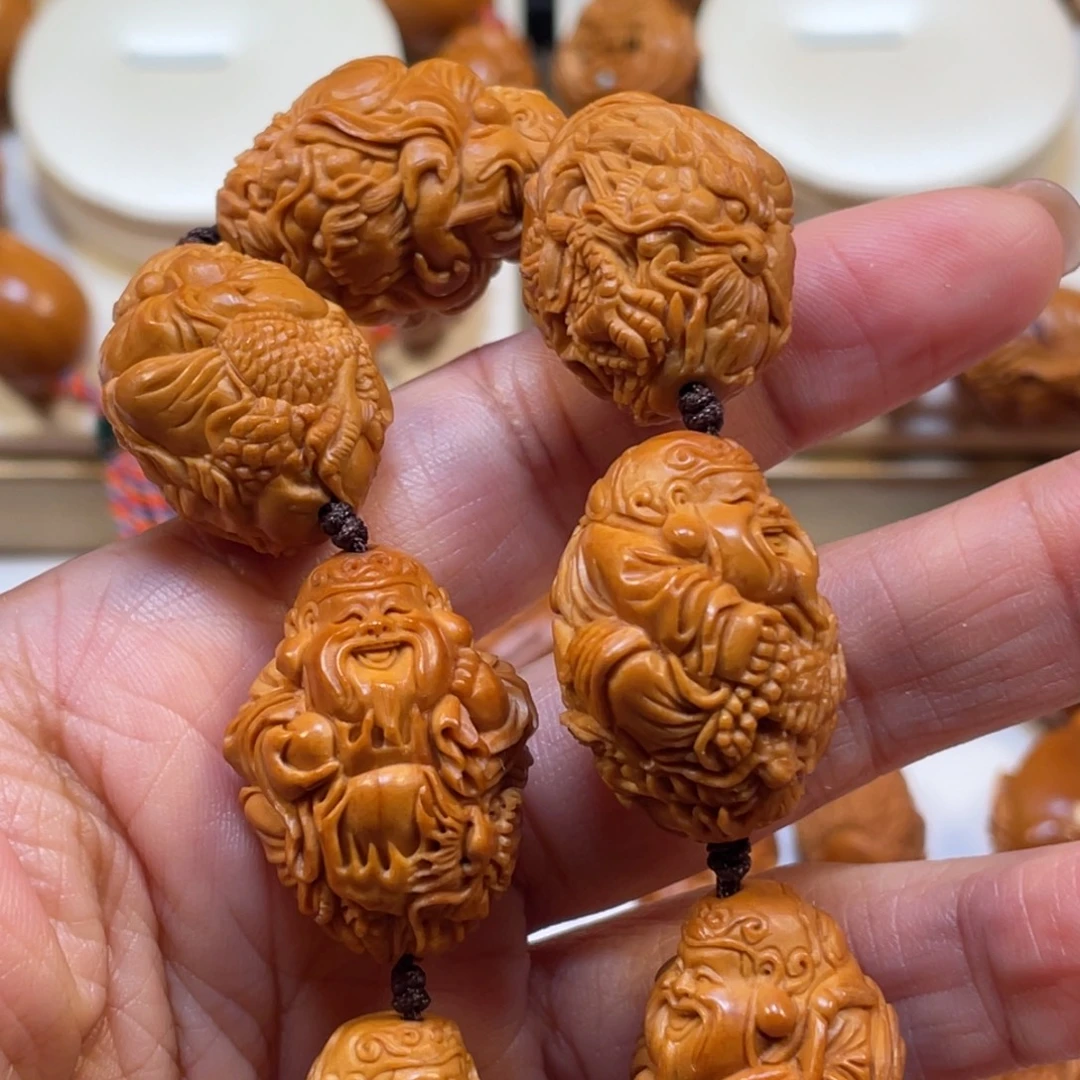 @***M九龙财神橄榄核手串
