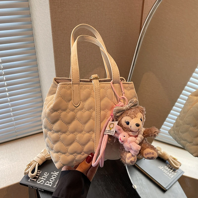 COOLE女包2025新款潮流简约小众设计纯色百搭洋气手提斜挎包