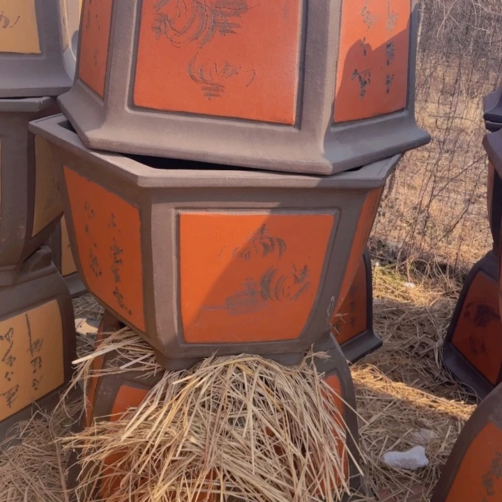 红陶口径100高58…………………………