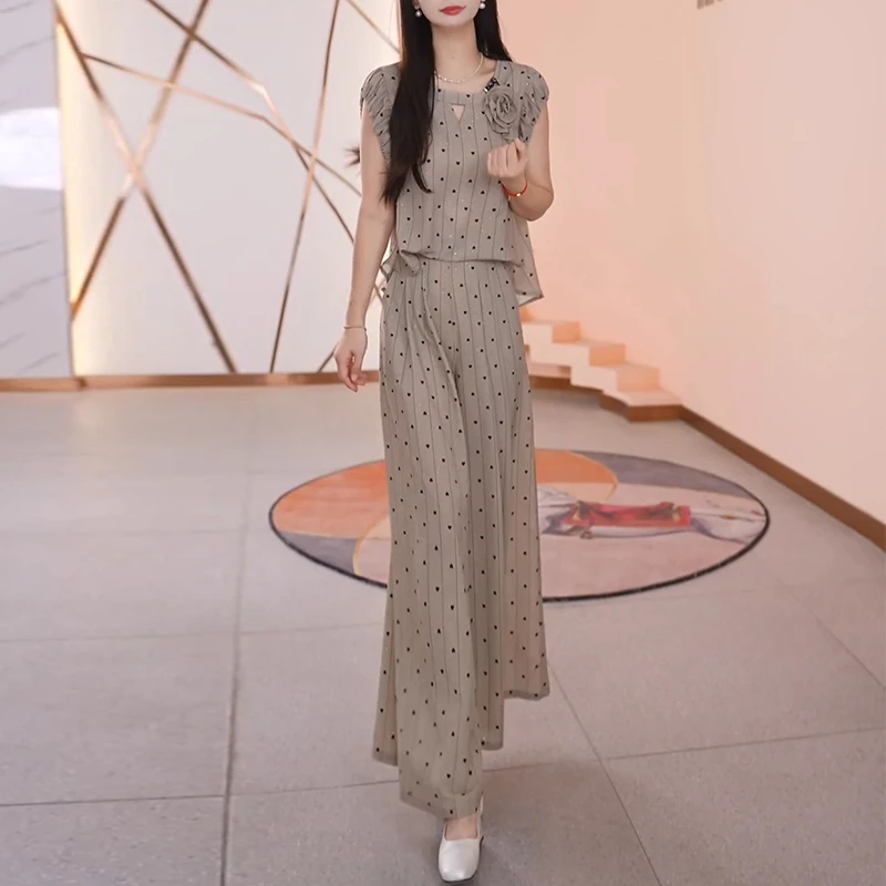 设计感时尚波点套装女夏季新款洋气花苞无袖衬衫上衣阔腿裤两件套