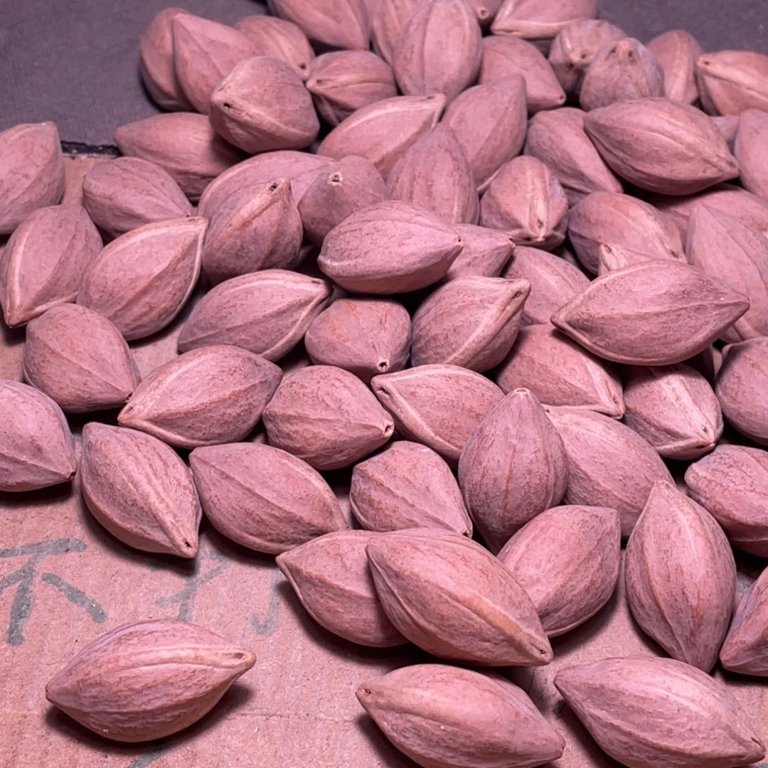 迷***娃橄榄核吊坠不退不换wry