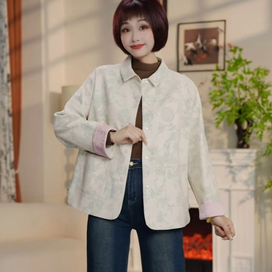 W218春秋时尚翻领印花拼接袖皮衣外套DM7