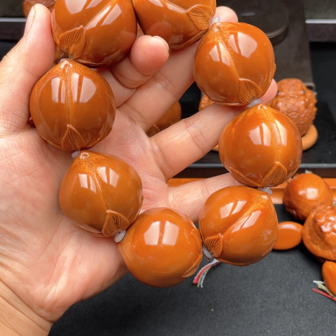 把件橄榄核寿桃手持