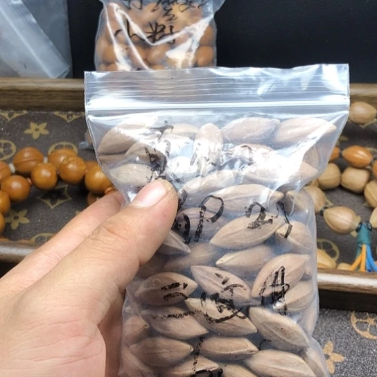 ✘***橄榄核吊坠好咯哦哦哦努力