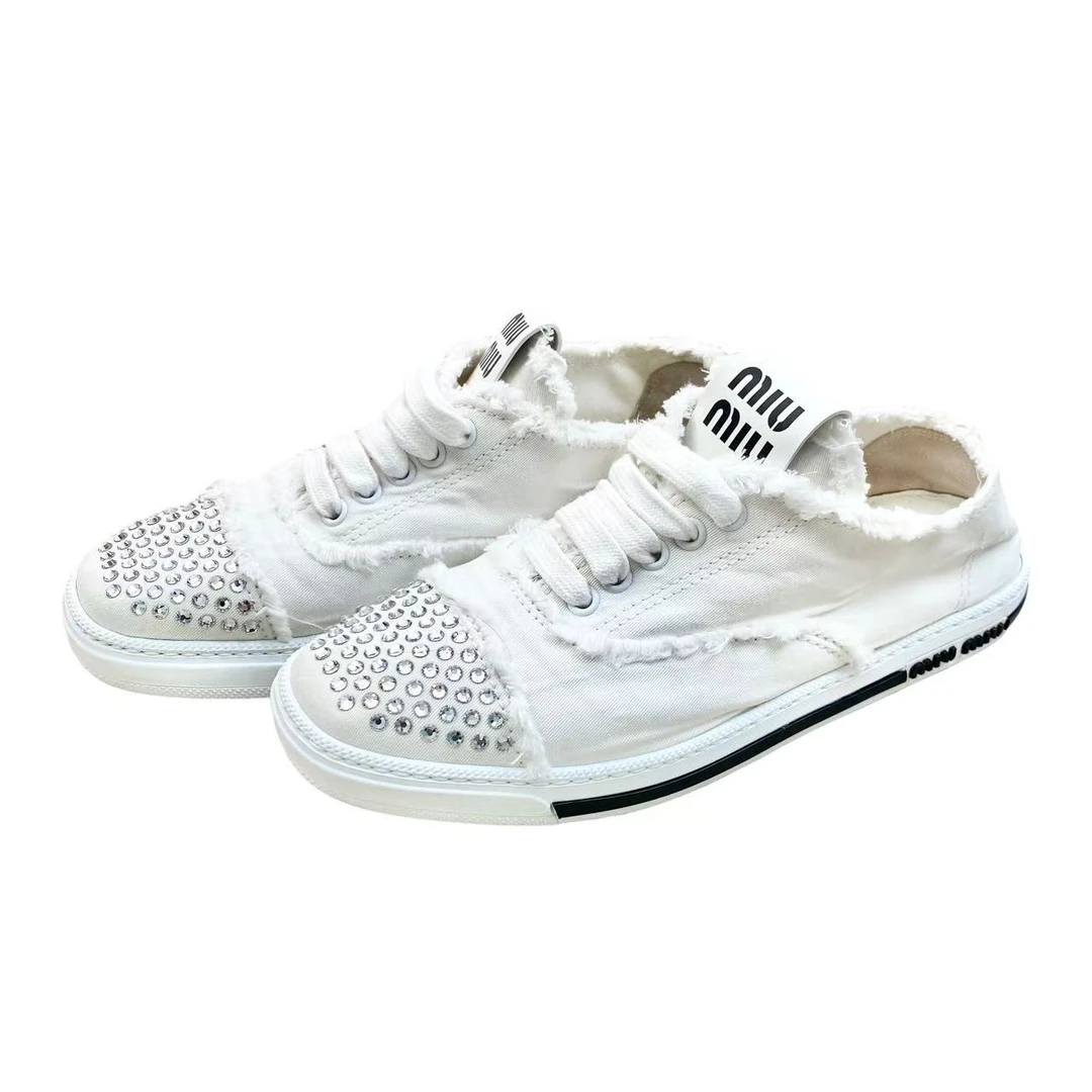 99新 MIU MIU/缪缪  zz115 水钻装饰白色帆布鞋 37.5码