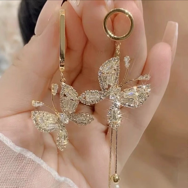 铜合金合成锆石耳饰 s925设计感甜美个性蝴蝶流苏不对称耳坠1558