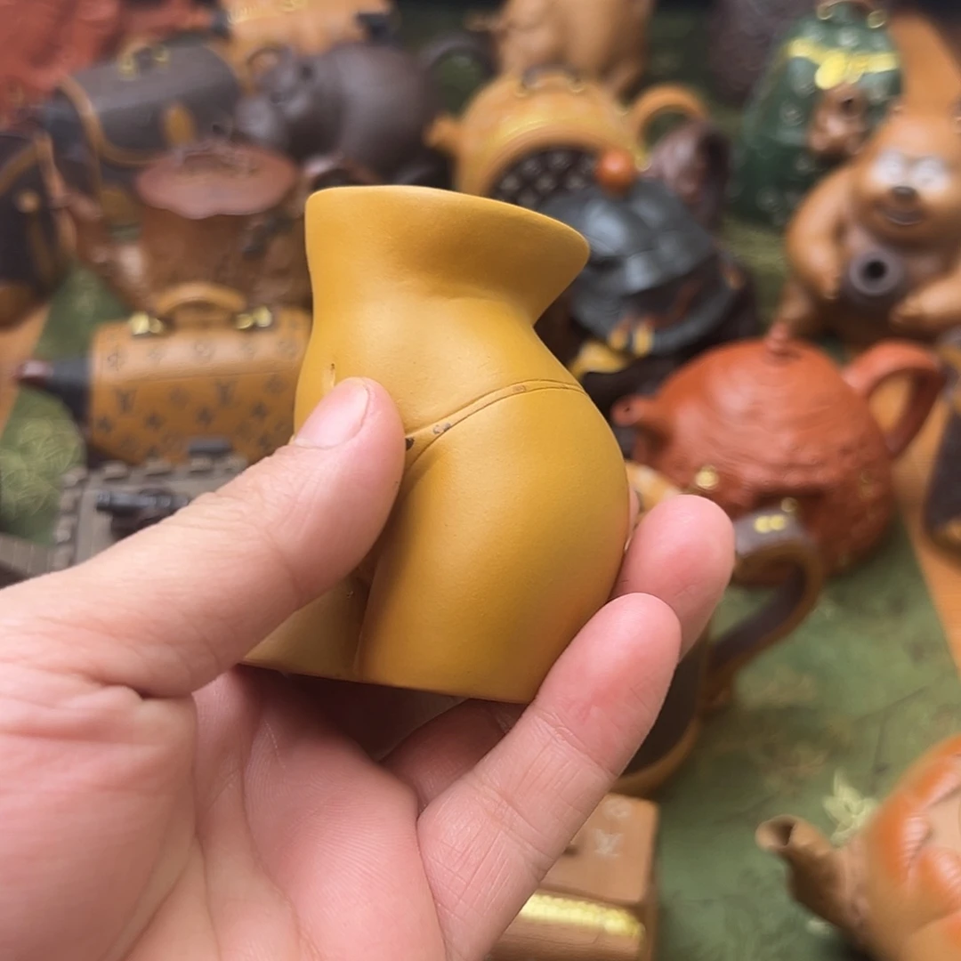 紫砂茶壶杯子的味道就好像