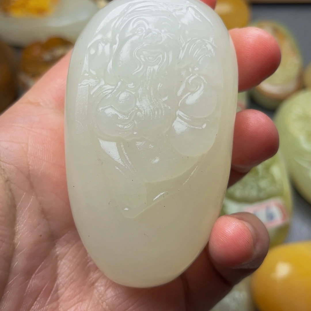 石材方解石手把件财神